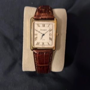 Vintage tank watches, leather straps. All in good working condition.